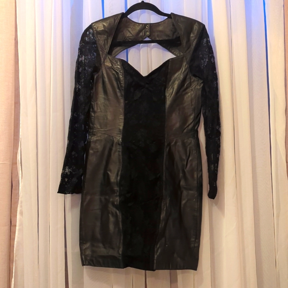 Form fitting vintage leather and lace dress